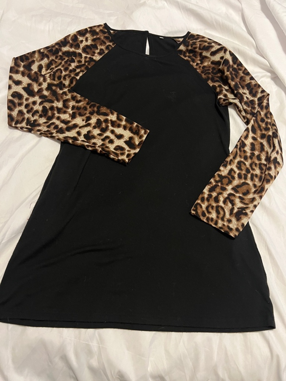 SHEIN Black Dress with Leopard Print Long Sleeves, has pockets.